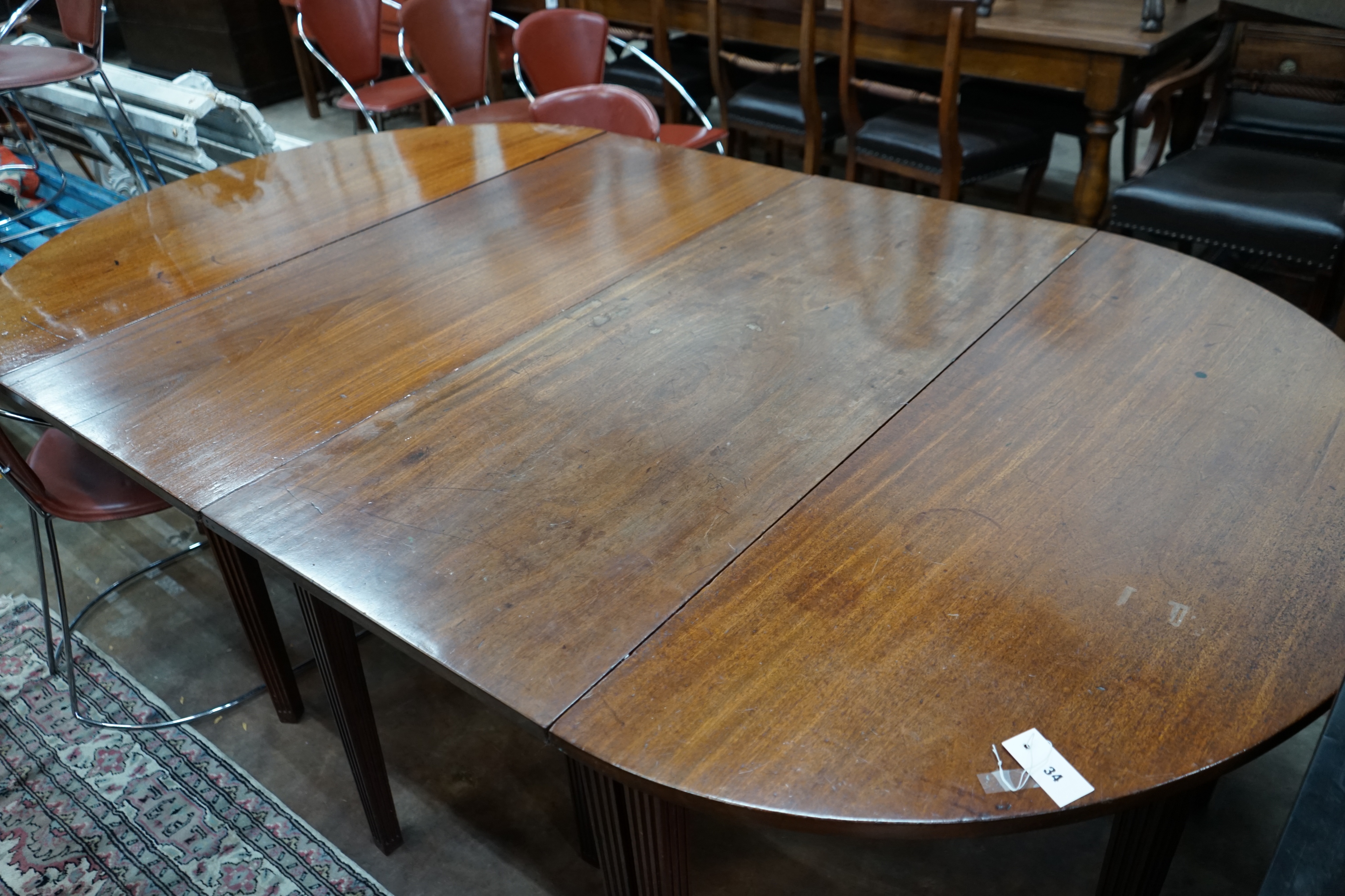 A George III mahogany D end extending dining table, extended 221cm width 132cm height 72cm